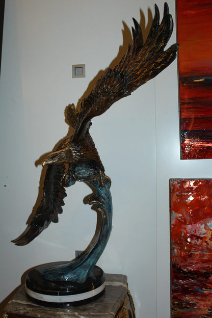 Eagle on a wave - Bronze Statue -  Size: 32"L x 12"W x 34"H. 