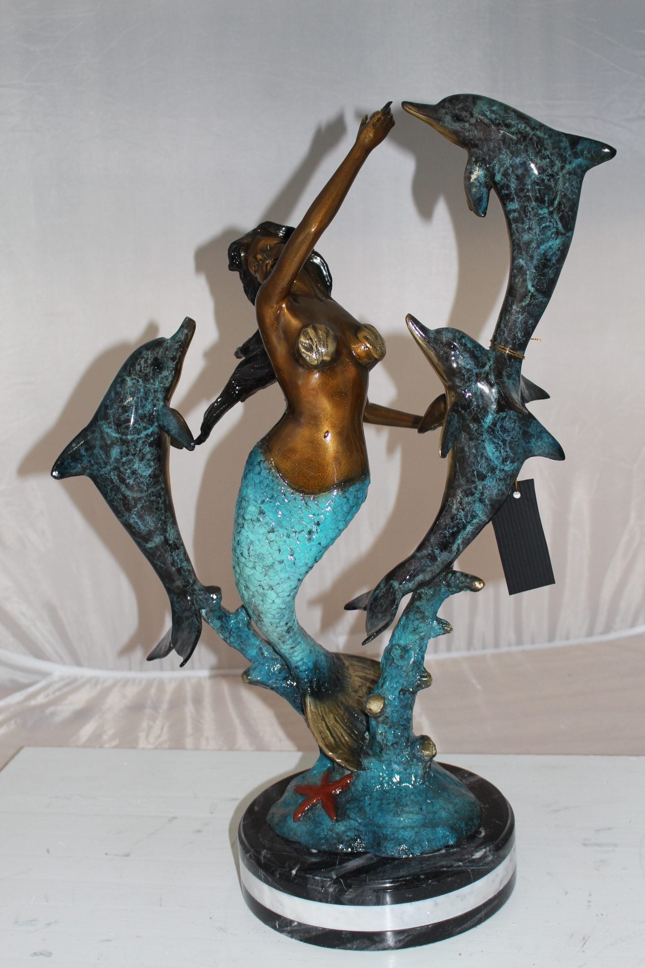 Mermaid with 3 dolphins Bronze Statue -  Size: 16"L x 10"W x 25"H. 