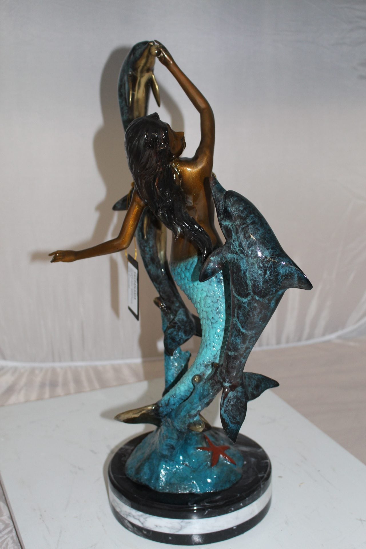 Mermaid with 3 dolphins Bronze Statue -  Size: 16"L x 10"W x 25"H. 