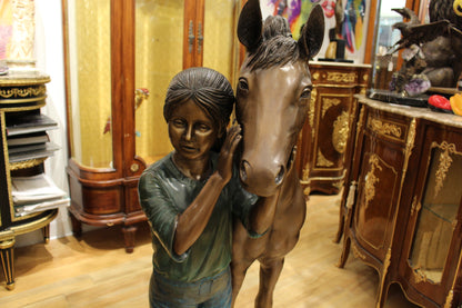 Young Girl and her pony Bronze Statue -  Size: 48"L x 20"W x 48"H. 