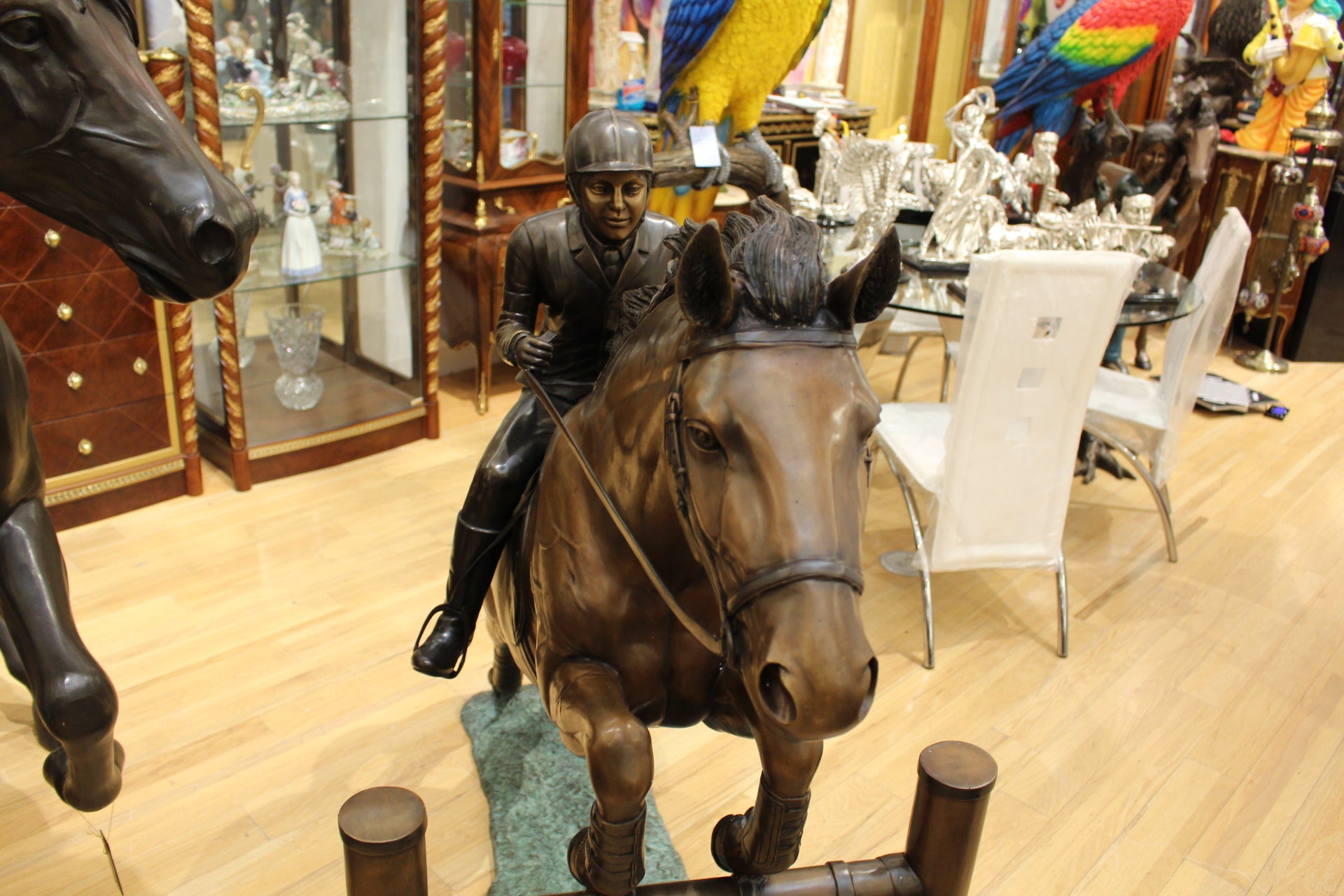 Jockey and Horse Jump a Fence Bronze Statue -  Size: 60"L x 30"W x 51"H. 