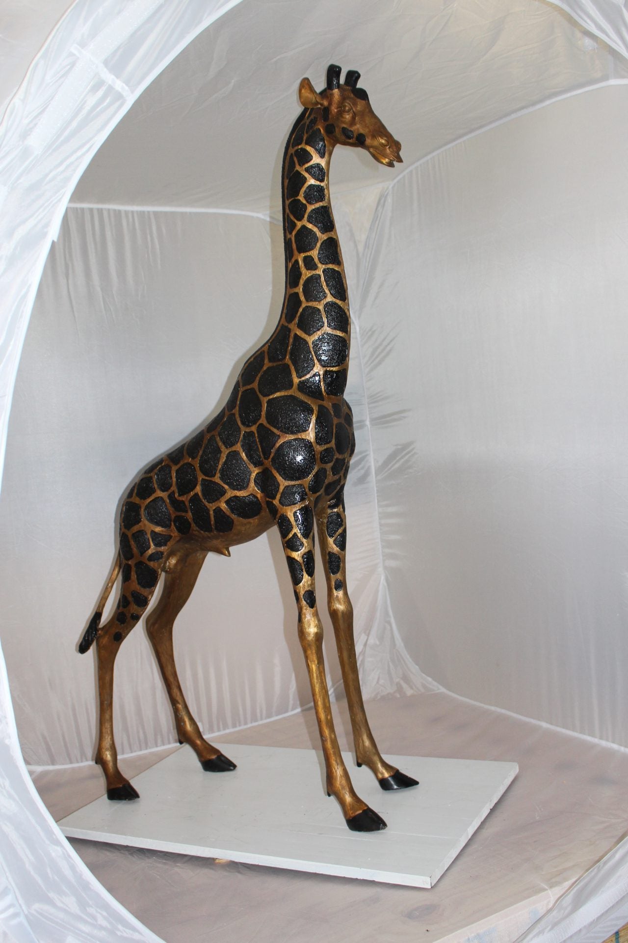 Pair of Giraffes Bronze Statues -  Size: 32"L x 12"W x 55"H. 