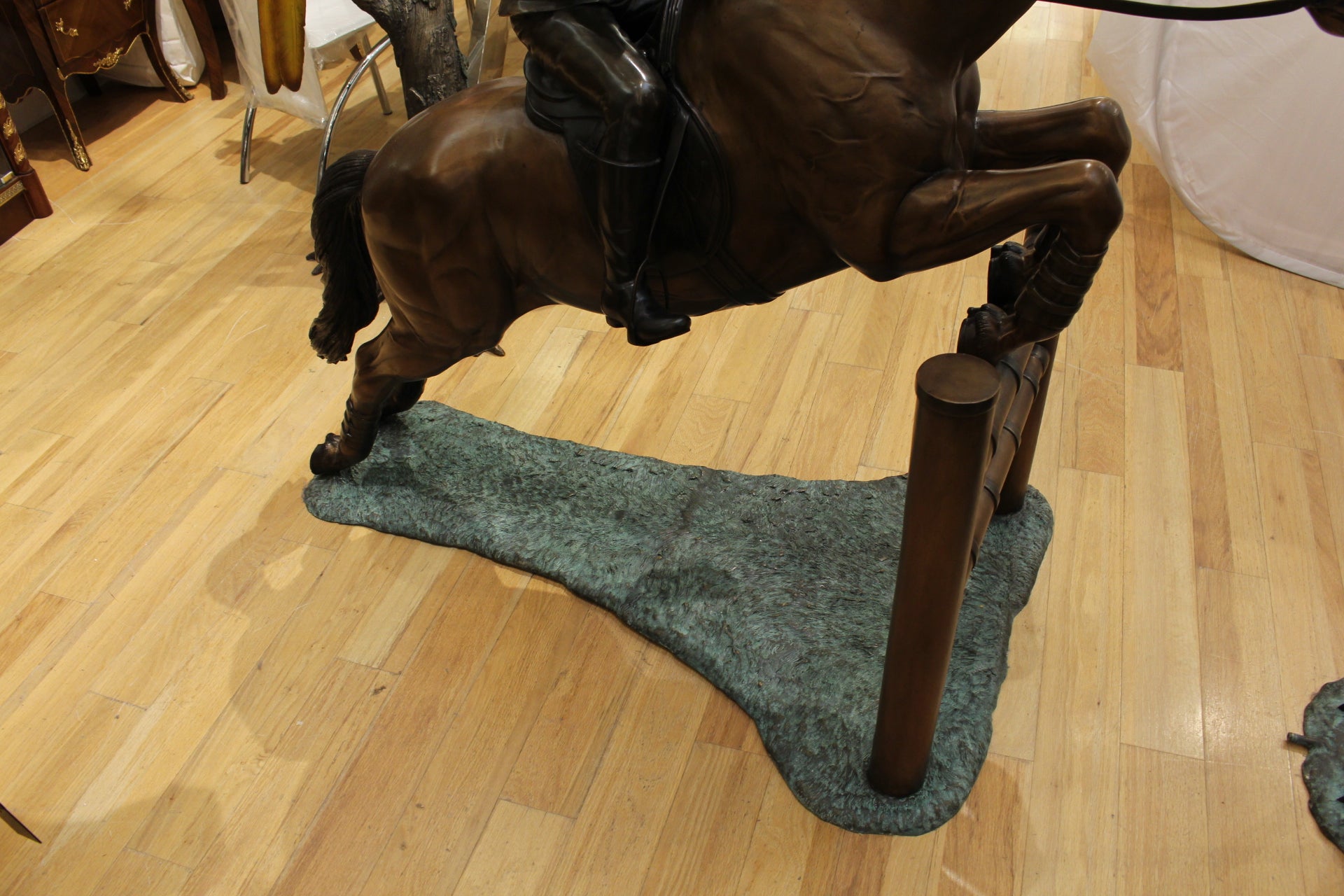 Jockey and Horse Jump a Fence Bronze Statue -  Size: 60"L x 30"W x 51"H. 