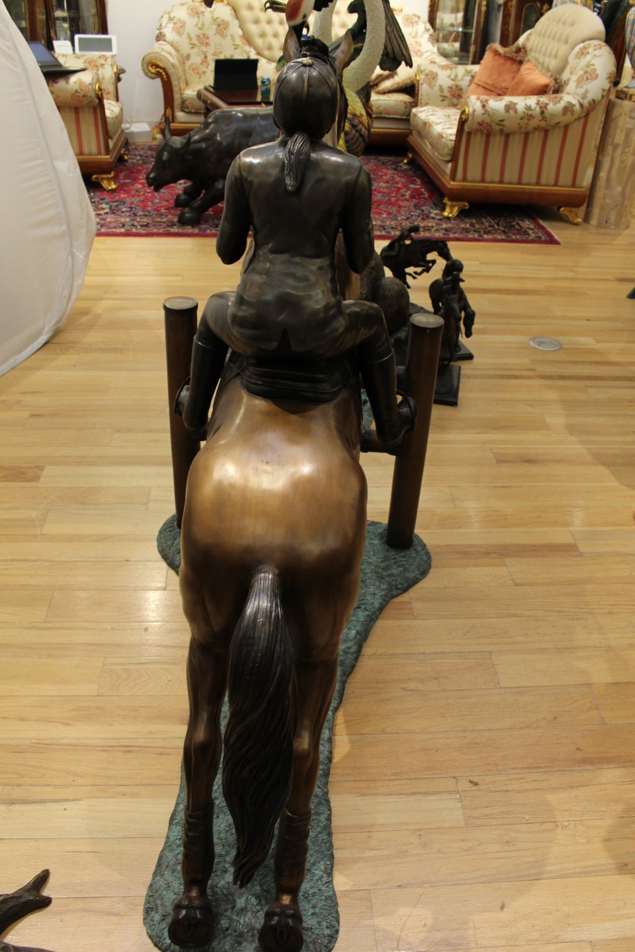 Jockey and Horse Jump a Fence Bronze Statue -  Size: 60"L x 30"W x 51"H. 