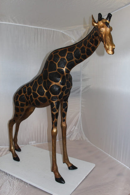 Pair of Giraffes Bronze Statues -  Size: 32"L x 12"W x 55"H. 