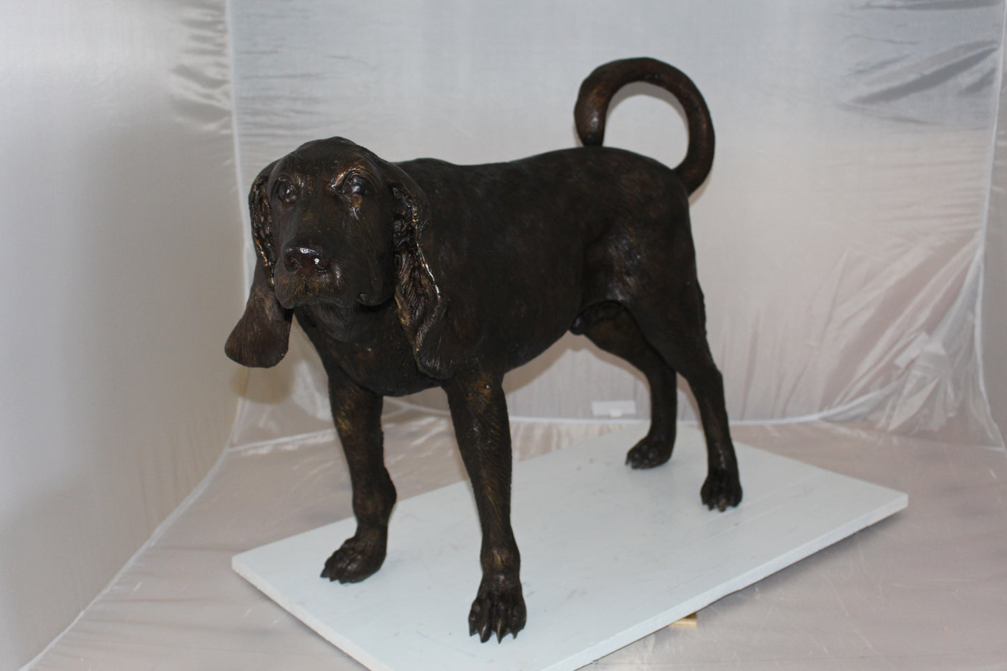 Hound dog Bronze Statue -  Size: 38"L x 12"W x 26"H. 