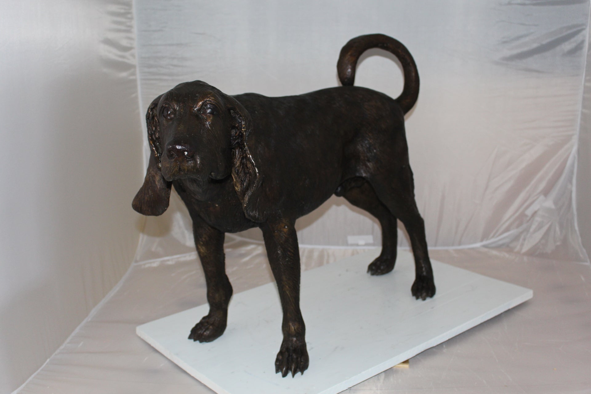 Hound dog Bronze Statue -  Size: 38"L x 12"W x 26"H. 