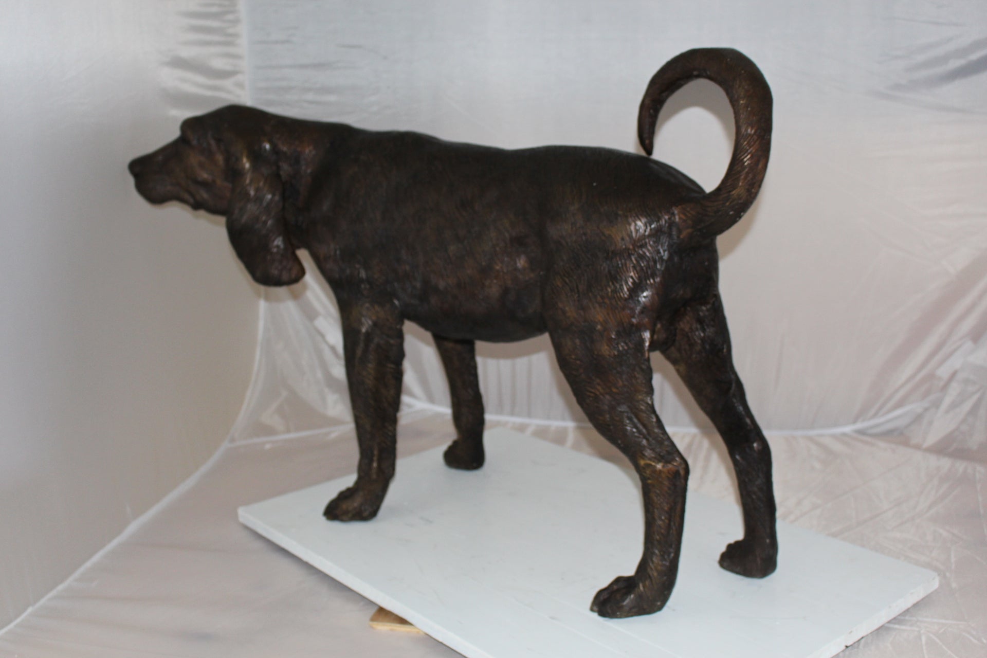 Hound dog Bronze Statue -  Size: 38"L x 12"W x 26"H. 