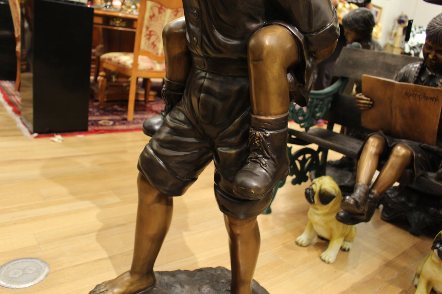 Boy Giving Girl Piggyback Ride Bronze Statue -  Size: 23"L x 16"W x 46"H. 