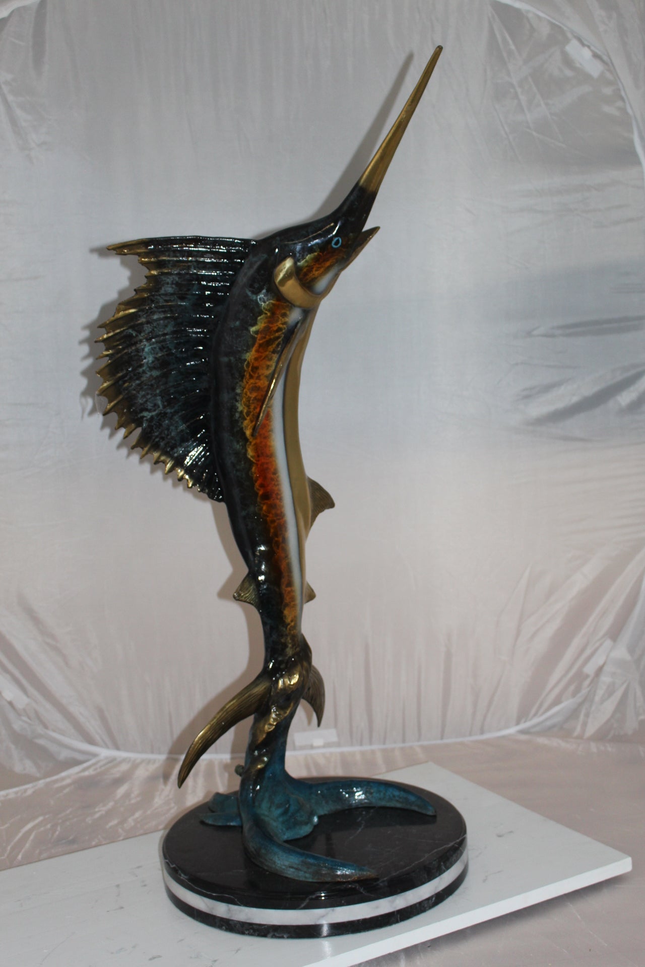 One Sailfish Bronze Statue -  Size: 18"L x 18"W x 43"H. 