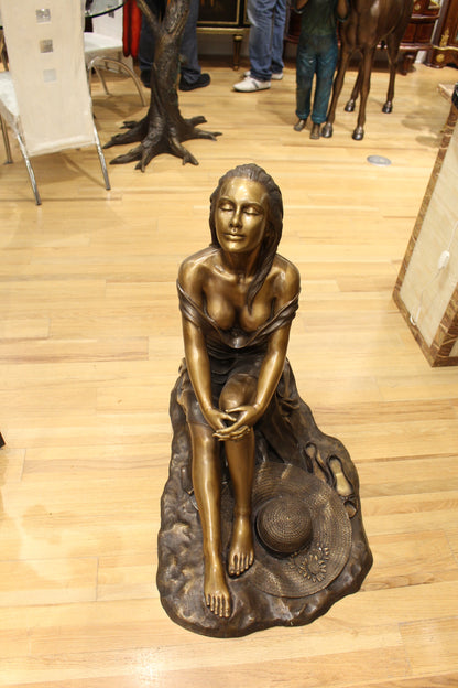 Lady on Stone Bronze Statue -  Size: 33"L x 23"W x 34"H. 