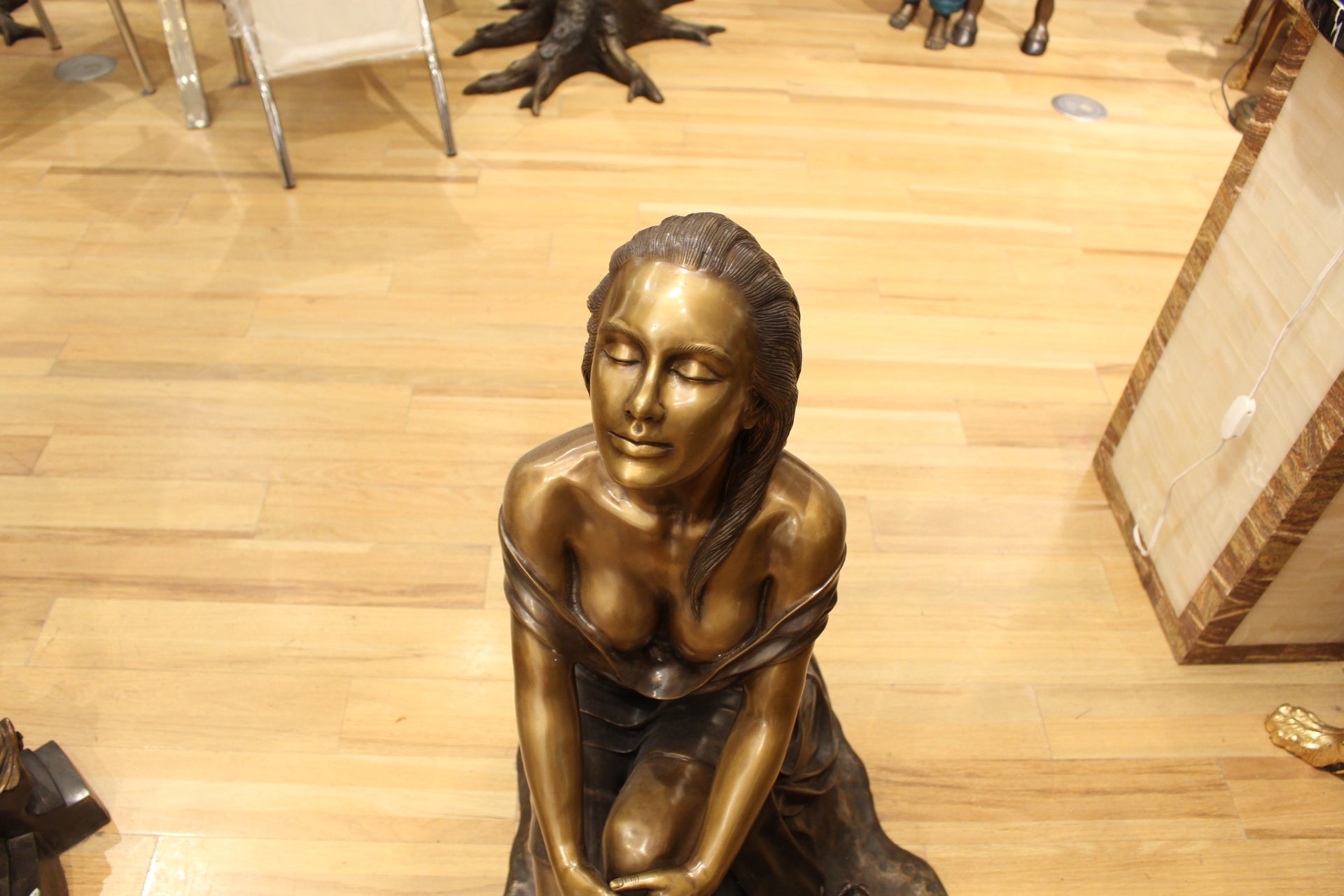 Lady on Stone Bronze Statue -  Size: 33"L x 23"W x 34"H. 