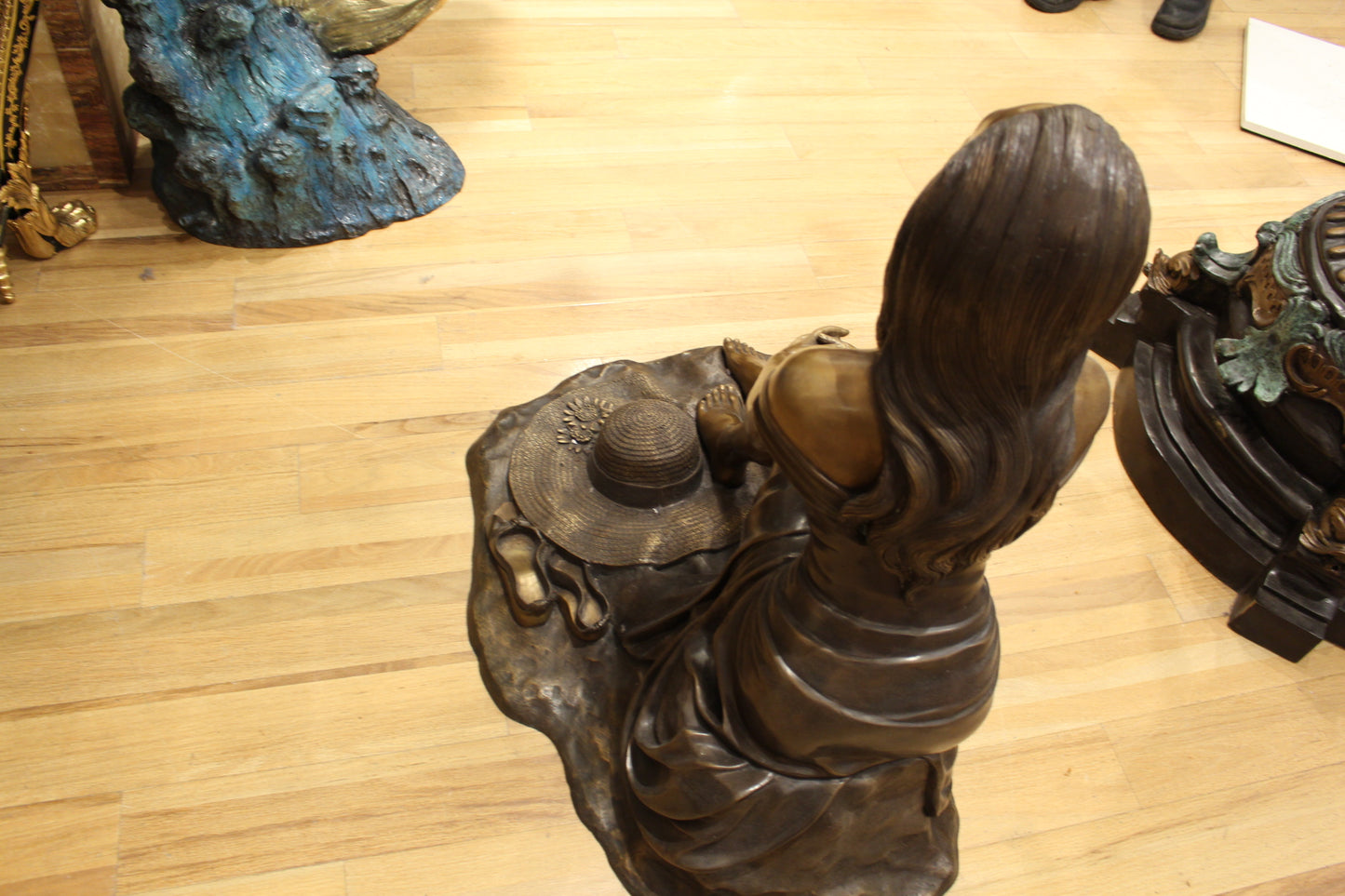 Lady on Stone Bronze Statue -  Size: 33"L x 23"W x 34"H. 