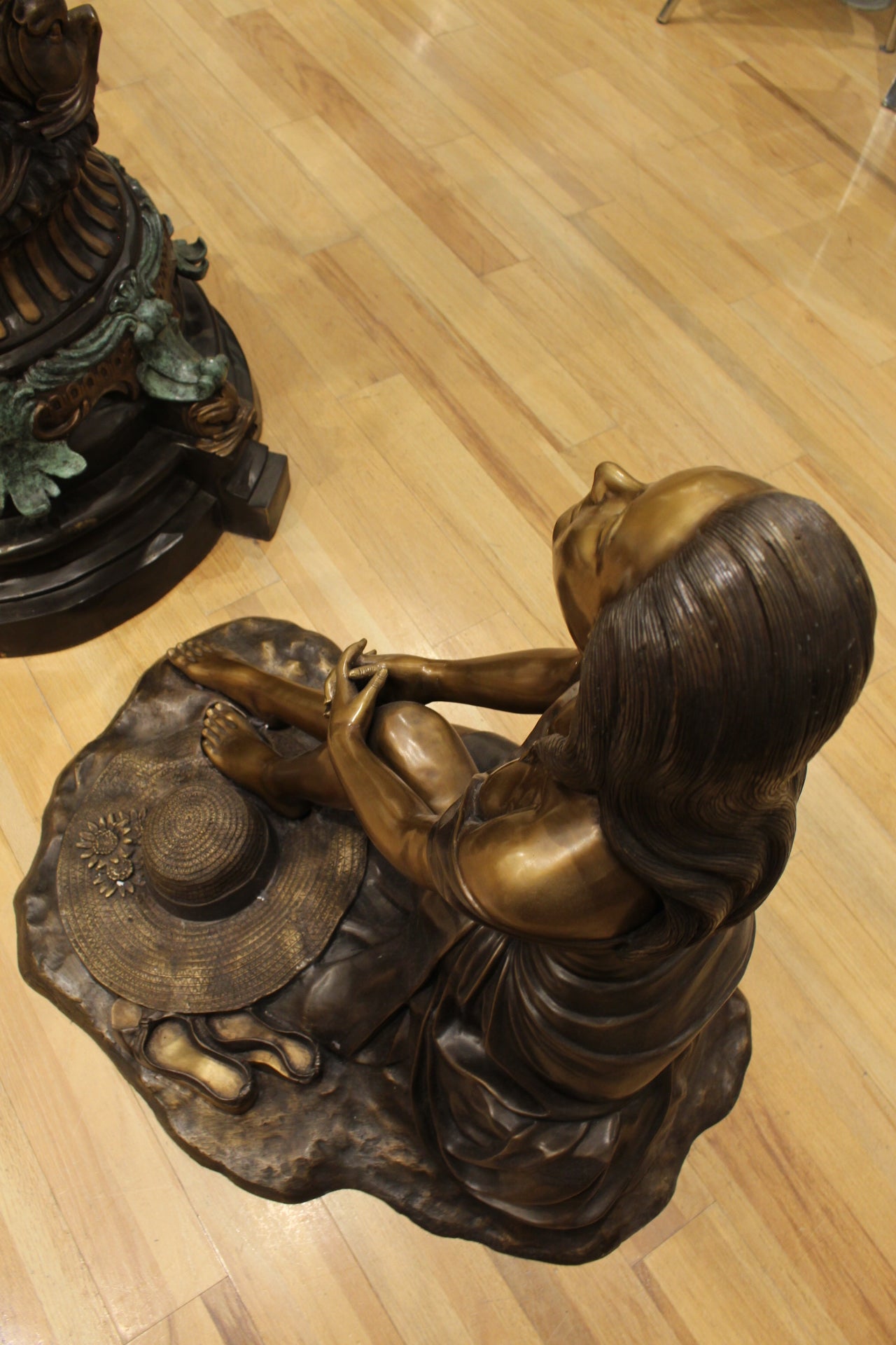 Lady on Stone Bronze Statue -  Size: 33"L x 23"W x 34"H. 