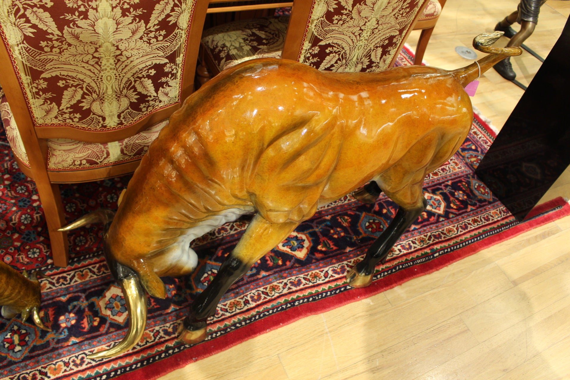 Bull Heads Down -Large Bronze Statue -  Size: 48"L x 12"W x 30"H. 