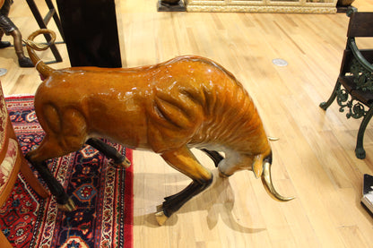 Bull Heads Down -Large Bronze Statue -  Size: 48"L x 12"W x 30"H. 