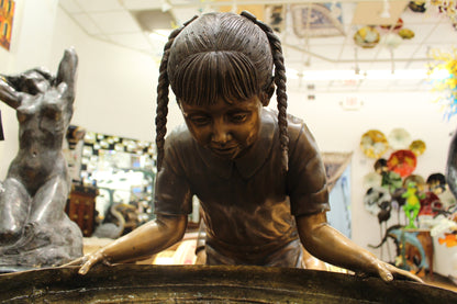 Boy Girl Drinking From Fountain Bronze Statue -  Size: 44"L x 24"W x 42"H. 