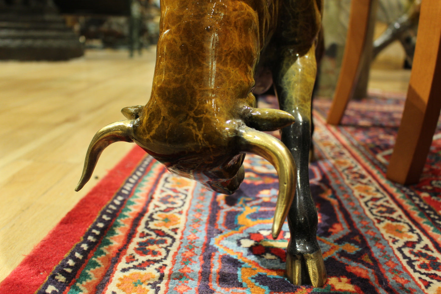 Bull Heads Down Small Bronze Statue -  Size: 24"L x 6"W x 16"H. 