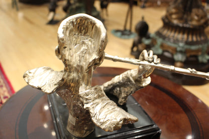 Man playing Flute Bronze Statue -  Size: 10"L x 8"W x 10"H. 