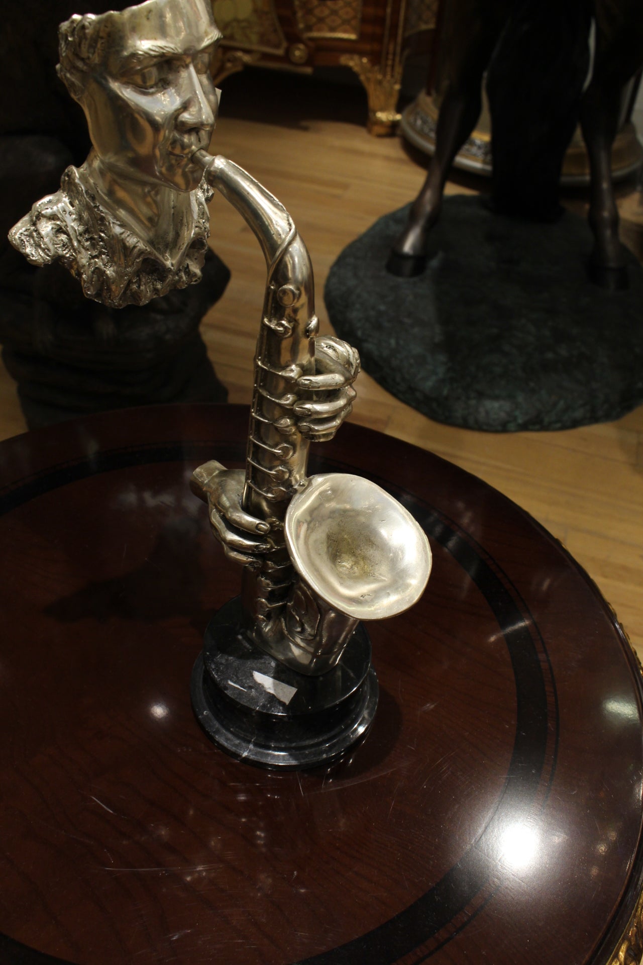 Man Playing Trombone Bronze Statue -  Size: 8"L x 5"W x 14"H. 
