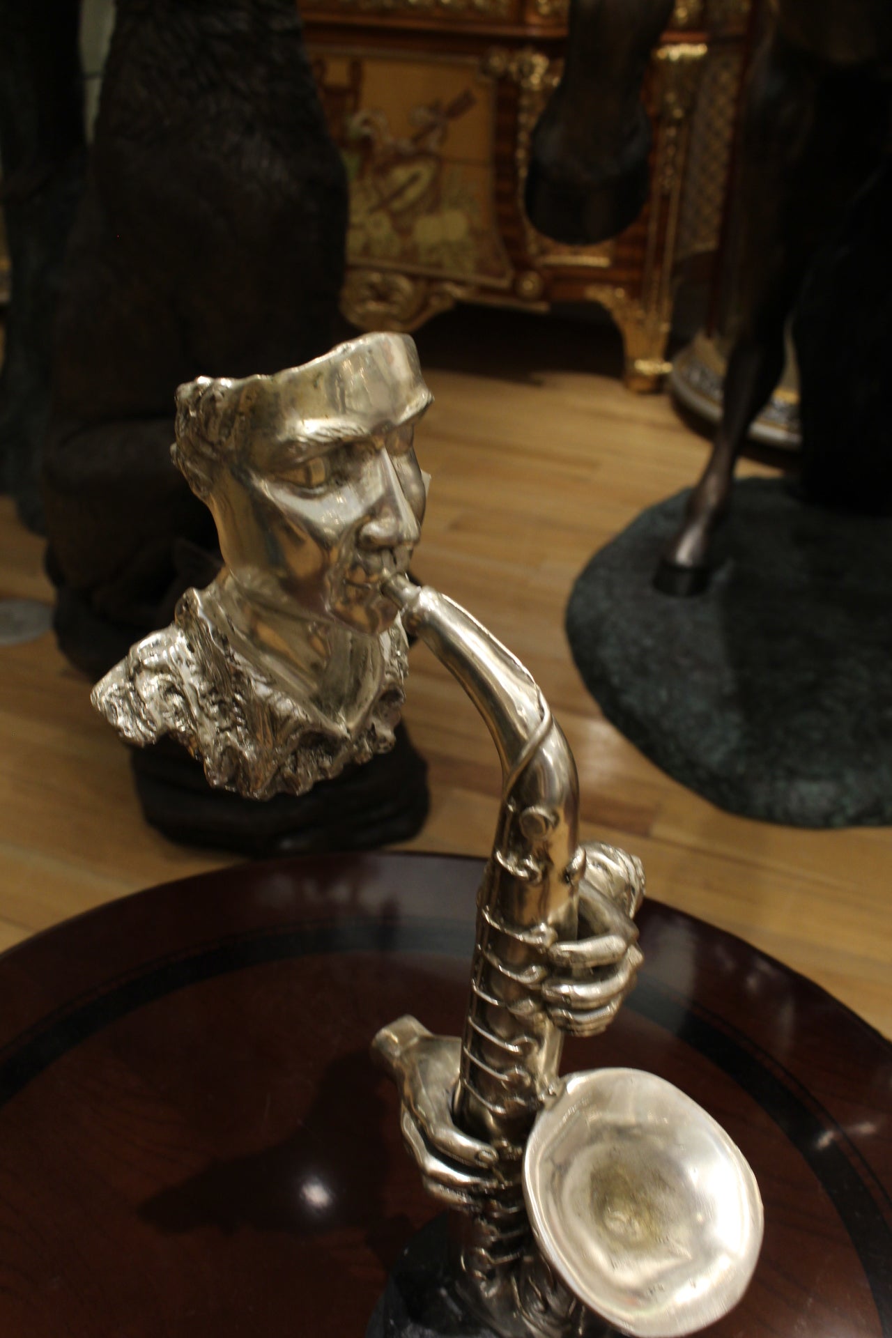 Man Playing Trombone Bronze Statue -  Size: 8"L x 5"W x 14"H. 