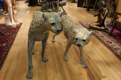 Pair of Golden-Plated Cheetahs Bronze Statue -  Size: 58"L x 10"W x 31"H. 