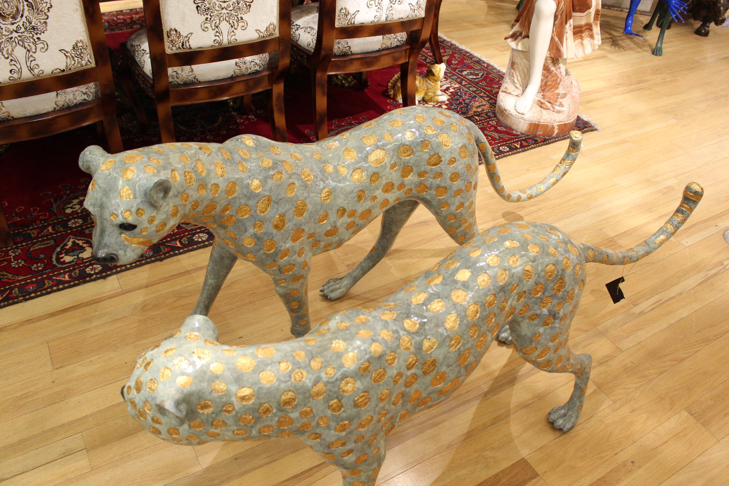 Pair of Golden-Plated Cheetahs Bronze Statue -  Size: 58"L x 10"W x 31"H. 