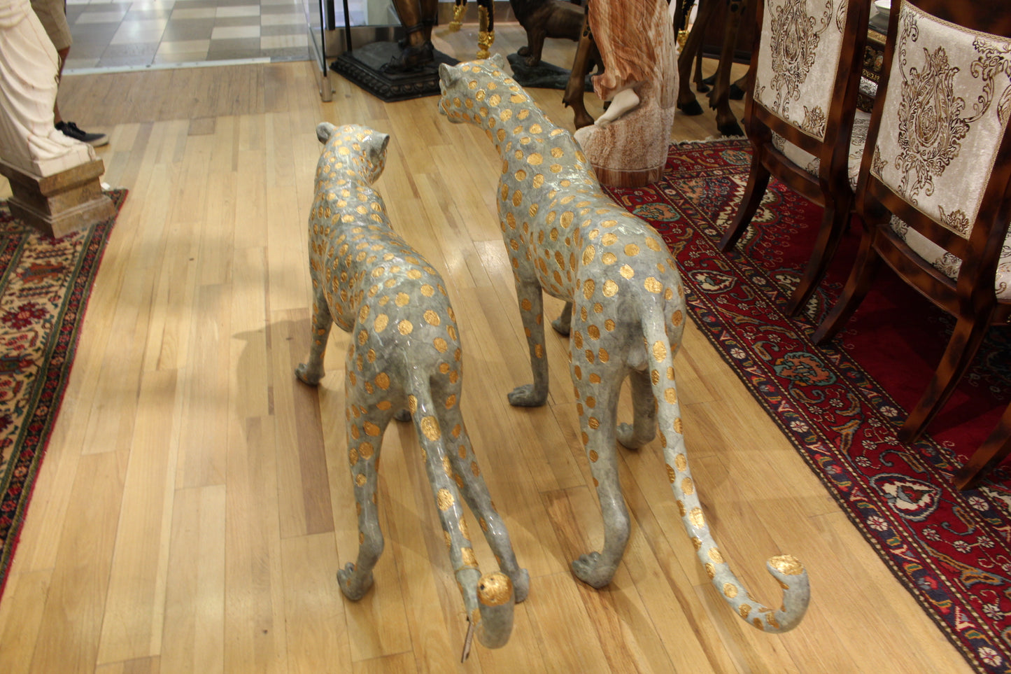 Pair of Golden-Plated Cheetahs Bronze Statue -  Size: 58"L x 10"W x 31"H. 