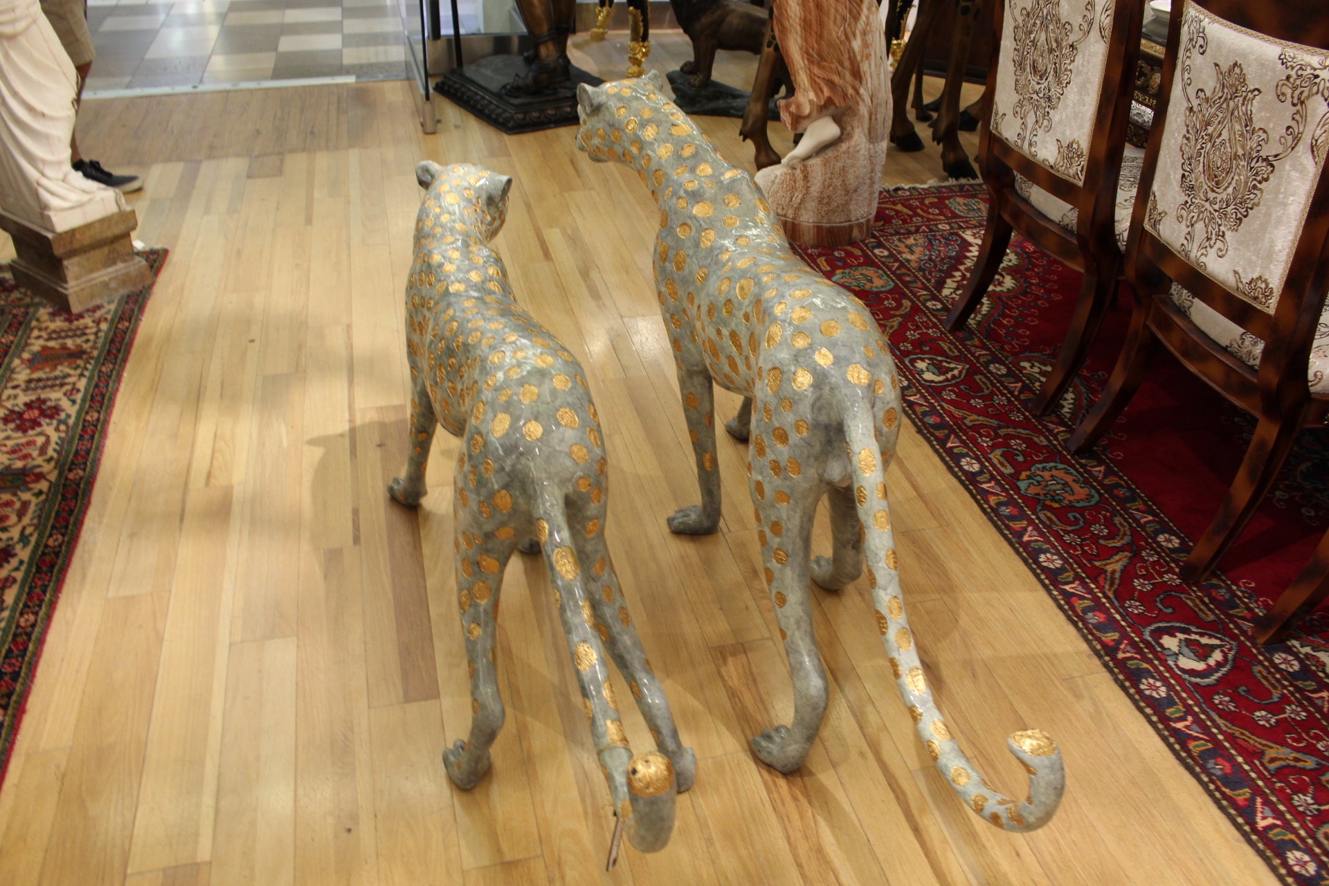 Pair of Golden-Plated Cheetahs Bronze Statue -  Size: 58"L x 10"W x 31"H. 