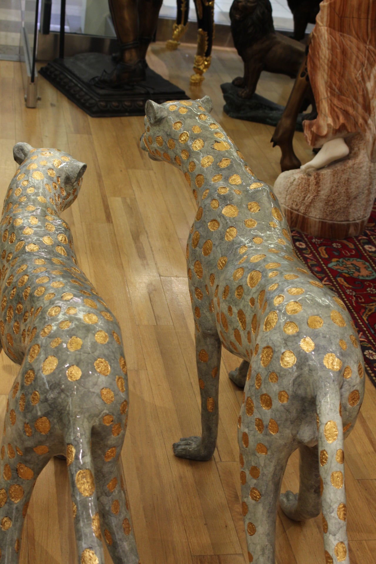 Pair of Golden-Plated Cheetahs Bronze Statue -  Size: 58"L x 10"W x 31"H. 