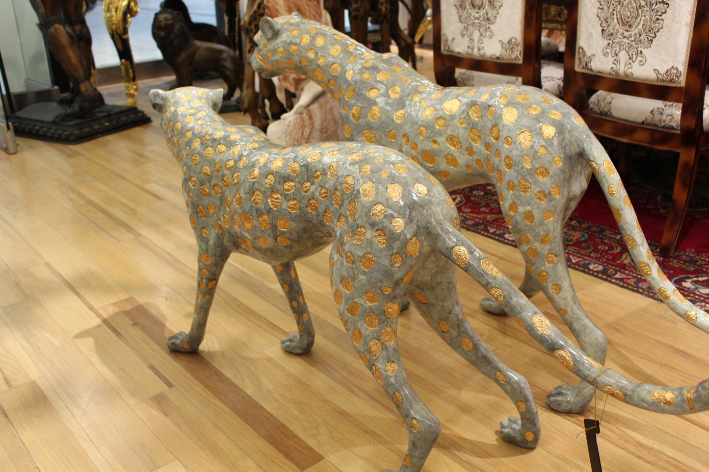 Pair of Golden-Plated Cheetahs Bronze Statue -  Size: 58"L x 10"W x 31"H. 