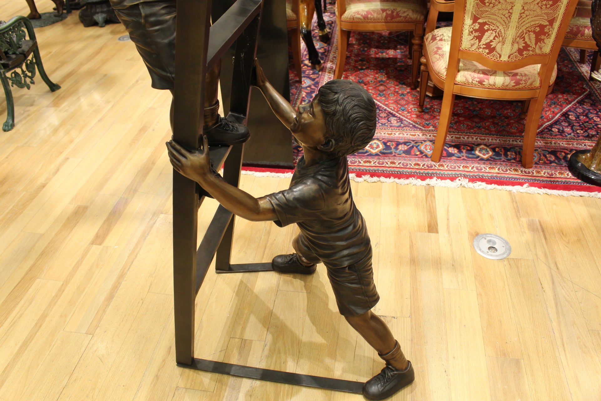 Three Children Playing on Ladder Bronze Statue -  Size: 24"L x 27"W x 96"H. 