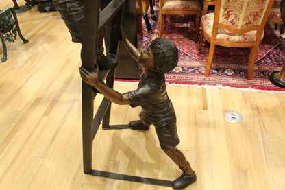 Three Children Playing on Ladder Bronze Statue -  Size: 24"L x 27"W x 96"H. 