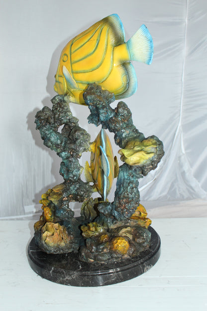 Two Butterfly fish swimming bronze statue -  Size: 12"L x 12"W x 24"H. 