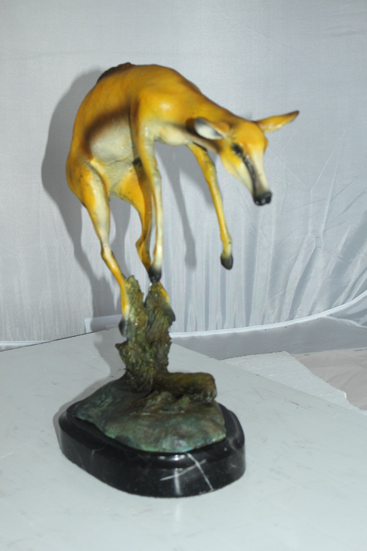 Jumping Impala bronze statue -  Size: 9"L x 7"W x 16"H. 