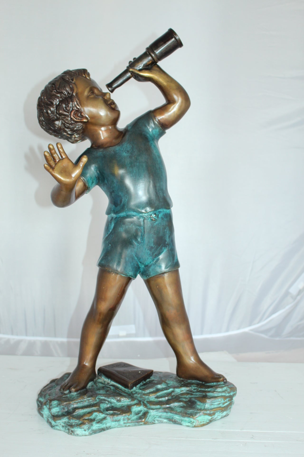 Boy with telescope Bronze Statue -  Size: 14"L x 10"W x 28"H. 