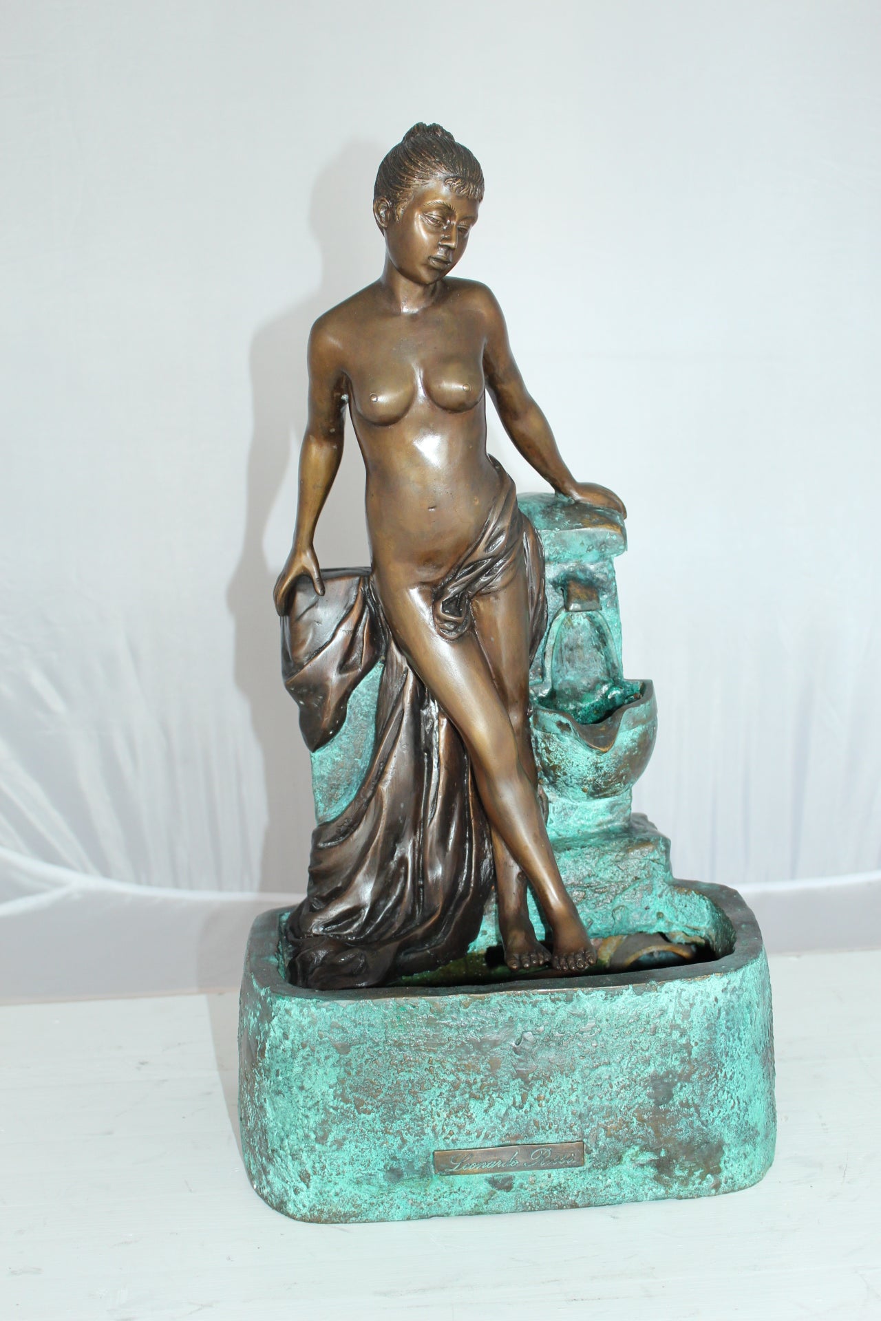 Lady on Wall fountain Bronze Statue -  Size: 12"L x 9"W x 21"H. 