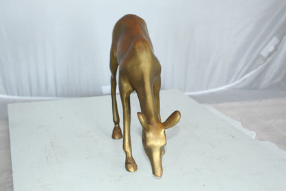 Two Tone color deer bronze statue -  Size: 13"L x 4"W x 11"H. 