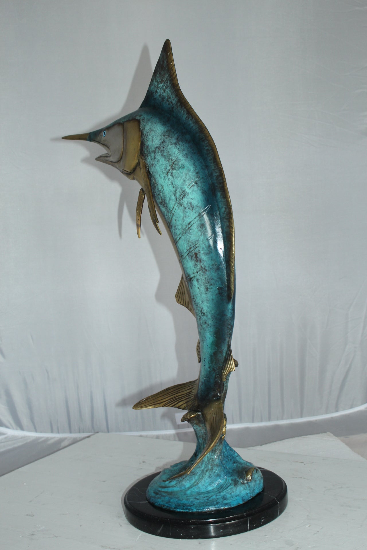 Single Marlin Fish bronze statue -  Size: 9"L x 9"W x 27"H. 