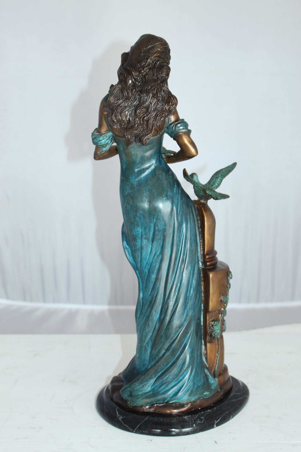 Girl with a Bird Bronze Statue -  Size: 7"L x 7"W x 18"H. 