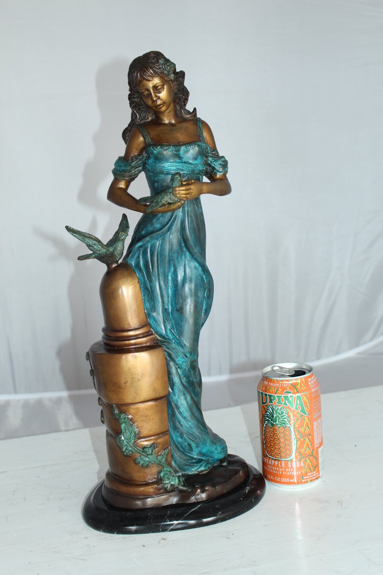 Girl with a Bird Bronze Statue -  Size: 7"L x 7"W x 18"H. 