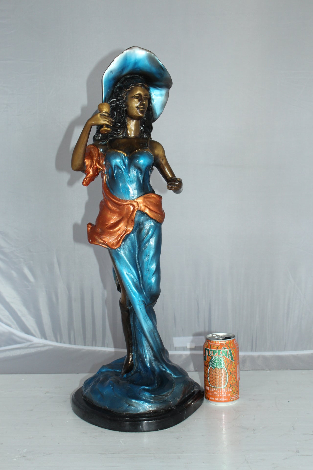 Lady Holding a Wine Glass Bronze Statue -  Size: 9"L x 11"W x 26"H. 