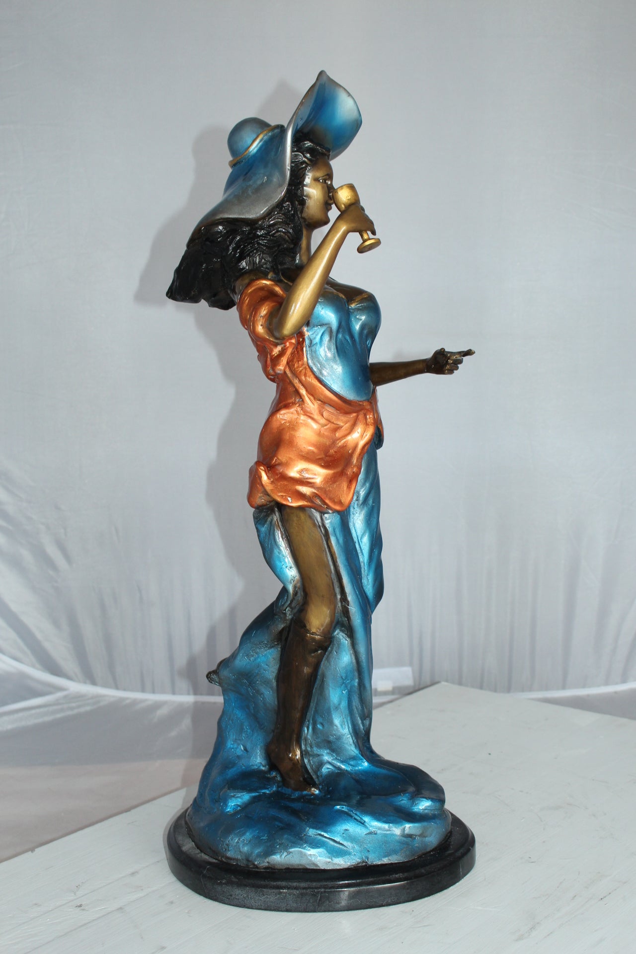 Lady Holding a Wine Glass Bronze Statue -  Size: 9"L x 11"W x 26"H. 