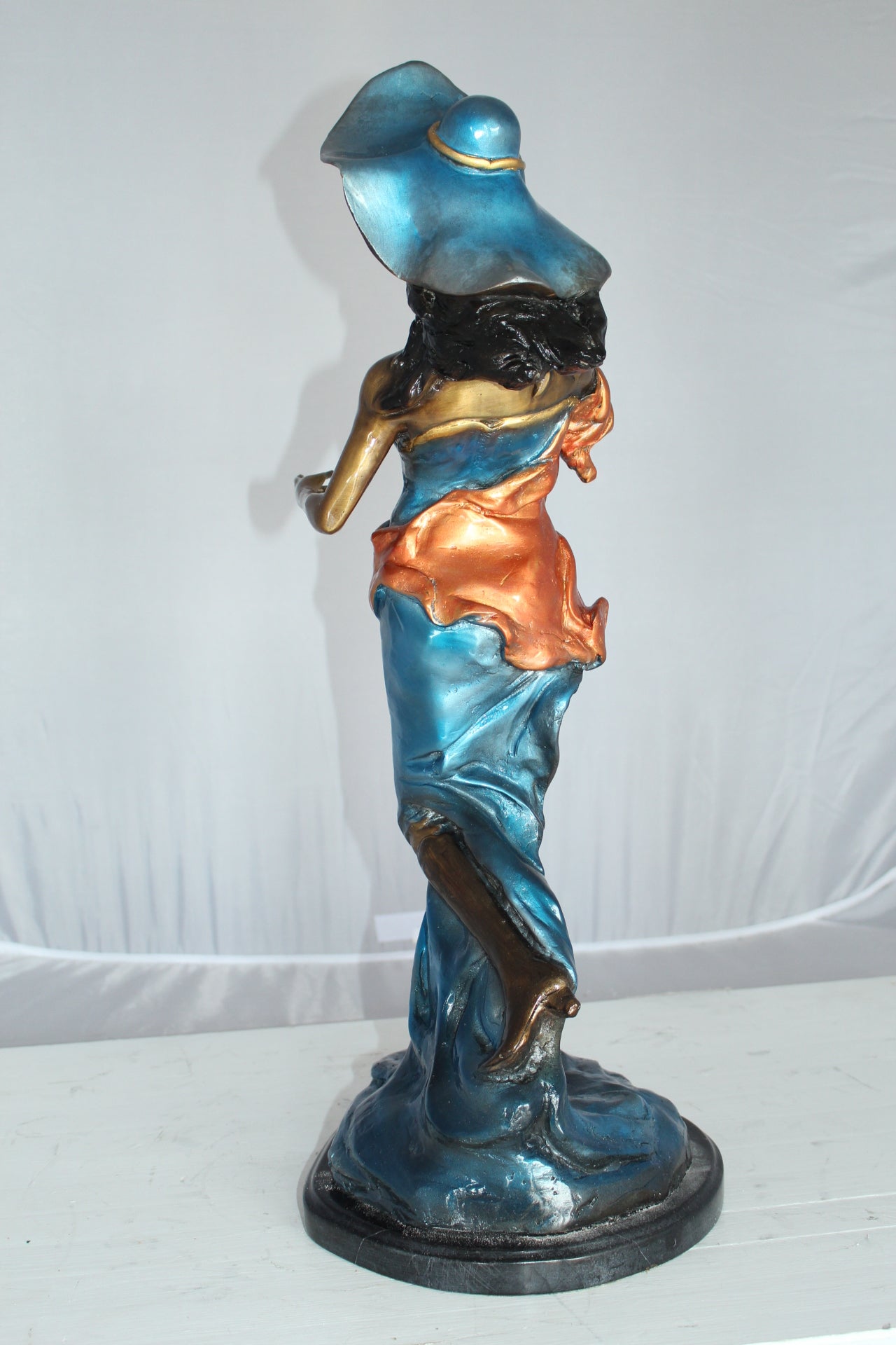 Lady Holding a Wine Glass Bronze Statue -  Size: 9"L x 11"W x 26"H. 