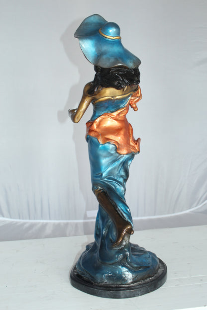 Lady Holding a Wine Glass Bronze Statue -  Size: 9"L x 11"W x 26"H. 