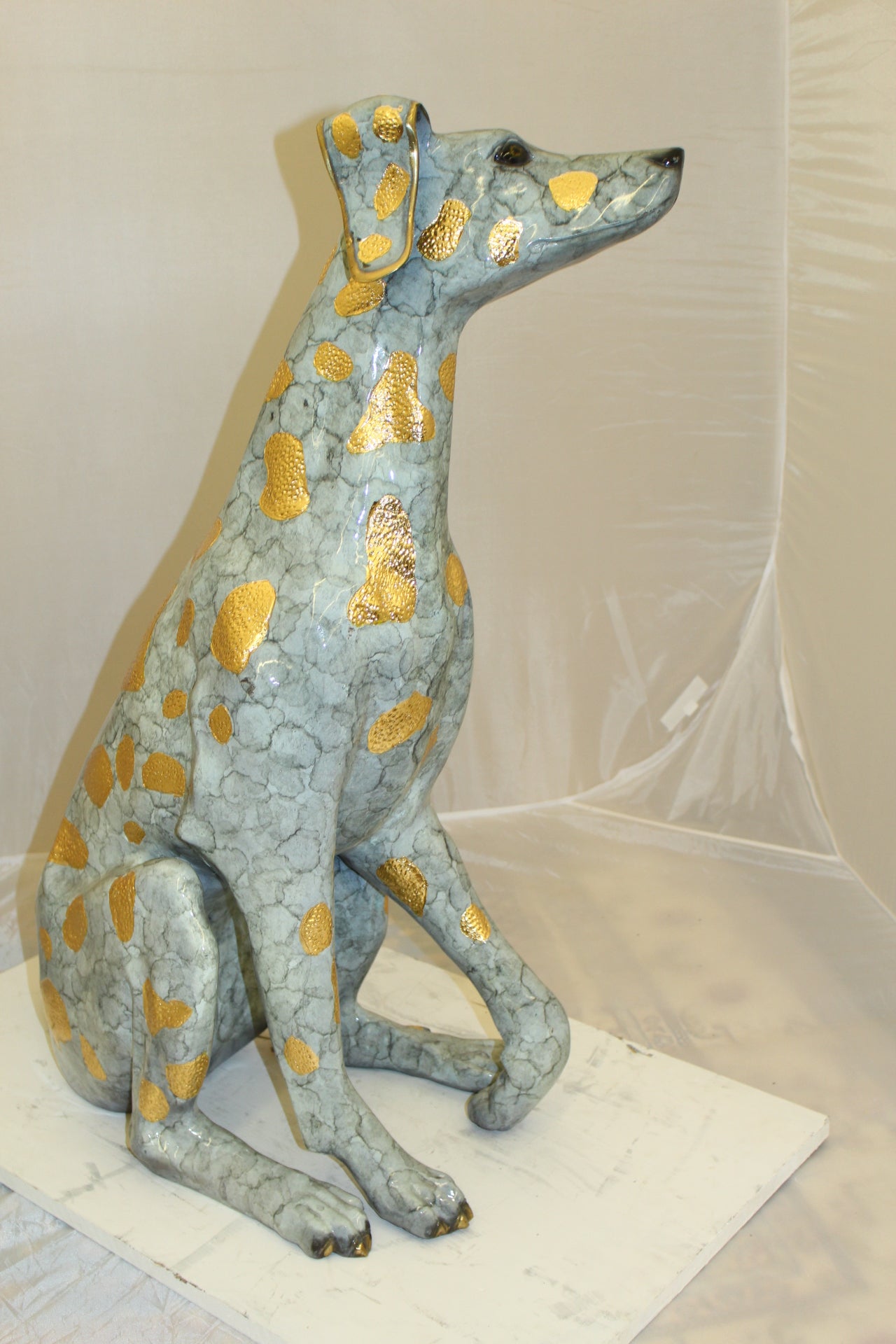 Pair of Golden Pleated Dalmatians Sitting Bronze Statue -  21"L x 16"W x 35"H. 