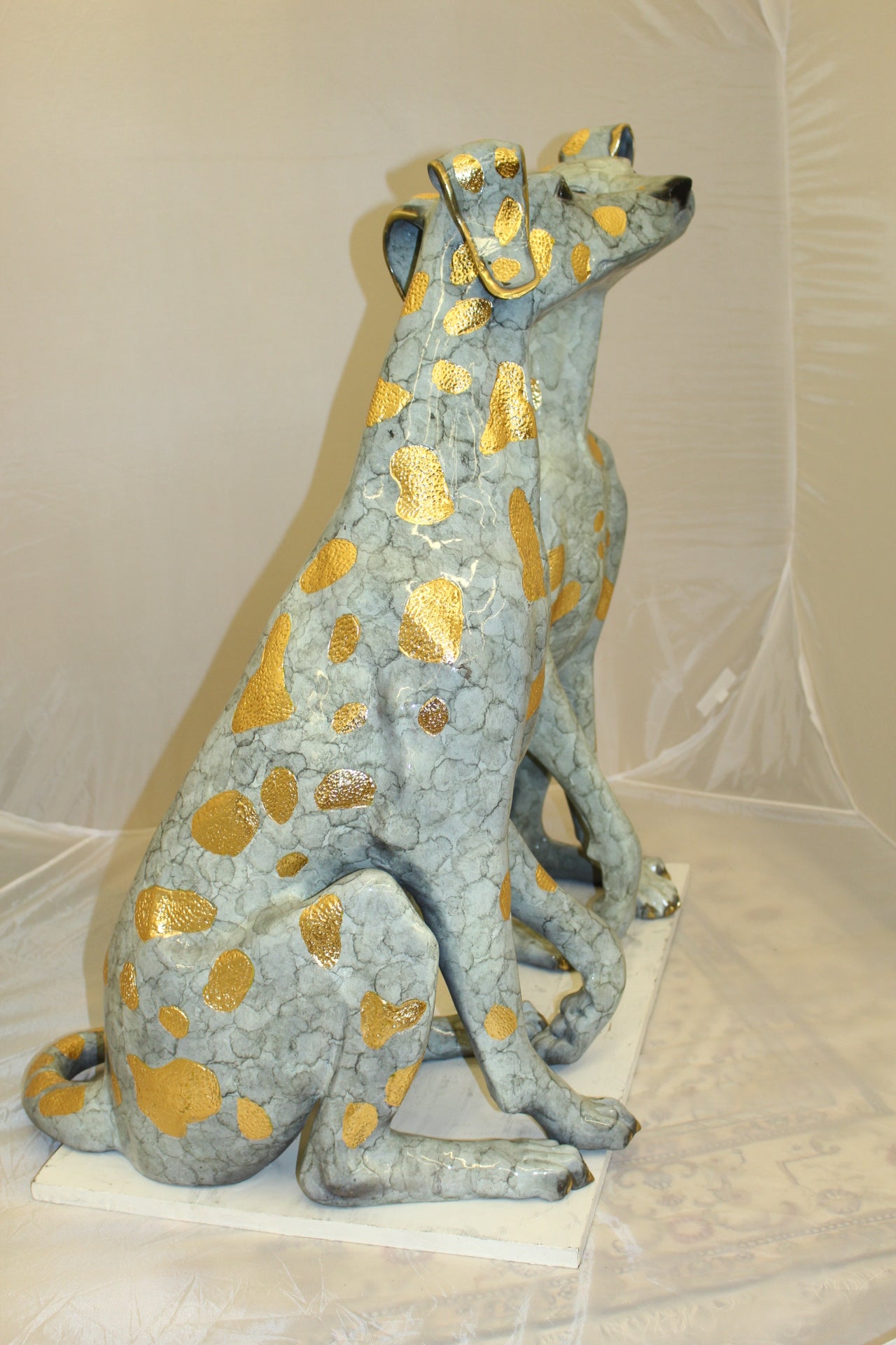 Pair of Golden Pleated Dalmatians Sitting Bronze Statue -  21"L x 16"W x 35"H. 