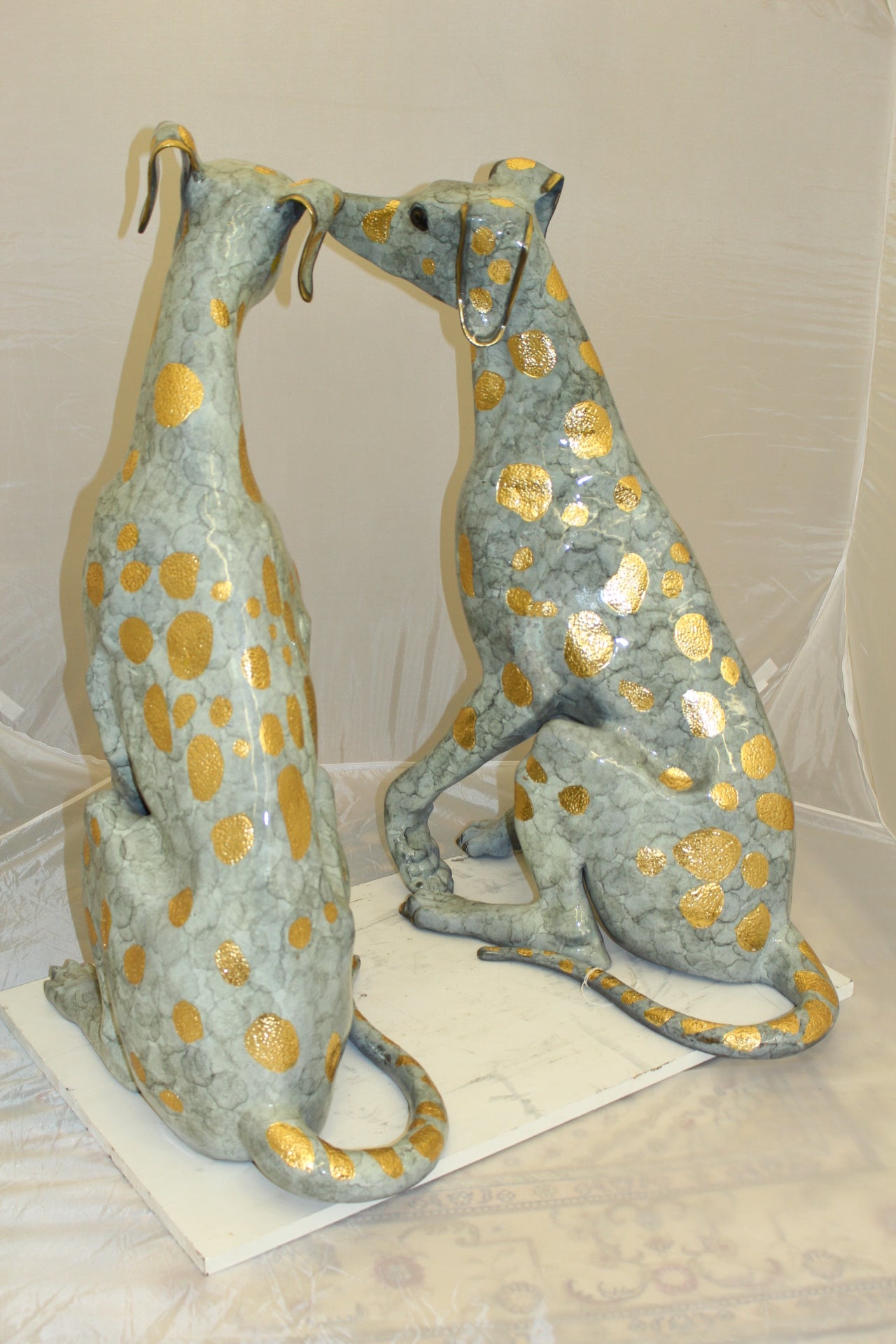 Pair of Golden Pleated Dalmatians Sitting Bronze Statue -  21"L x 16"W x 35"H. 