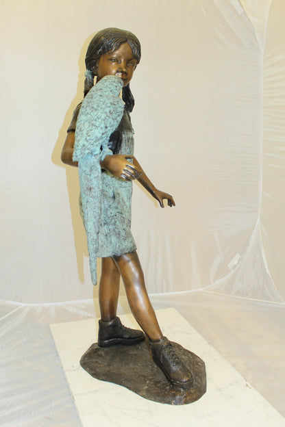 Girl Holding a Parrot Bronze Statue -  Size: 26"L x 19"W x 42"H. 
