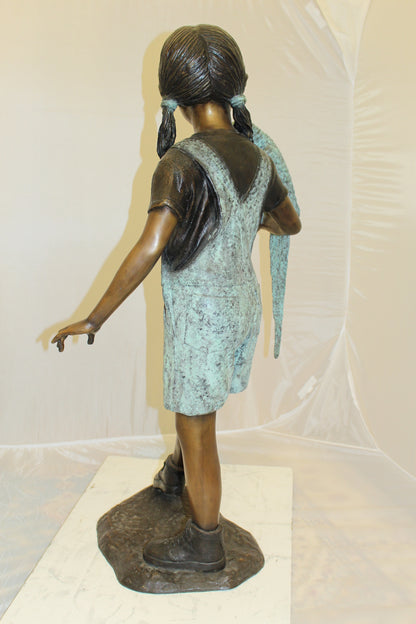 Girl Holding a Parrot Bronze Statue -  Size: 26"L x 19"W x 42"H. 
